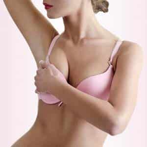 Young Caucasian Adult Woman Wearing Pink Bra Examining Her Breast Young Caucasian Adult Woman Wearing Pink Bra Examining Her Breast