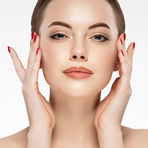 Woman beauty healthy clean skin, hand touching face