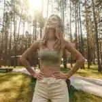 Smiling Woman With Closed Eyes In Nature