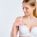 Girl Touching Breast Plastic Surgery Salon Procedure