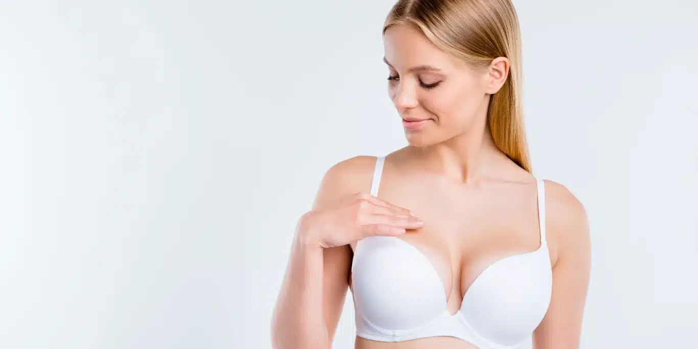 Girl Touching Breast Plastic Surgery Salon Procedure